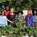 Shital Parikh (left) and a few of the residents that help maintain the Belden Community Garden. Photo by Saoimanu Sope.