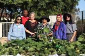 Shital Parikh (left) and a few of the residents that help maintain the Belden Community Garden. Photo by Saoimanu Sope.