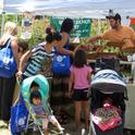 Mothers in Recovery visit the farmers market together to buy healthy food for their families.