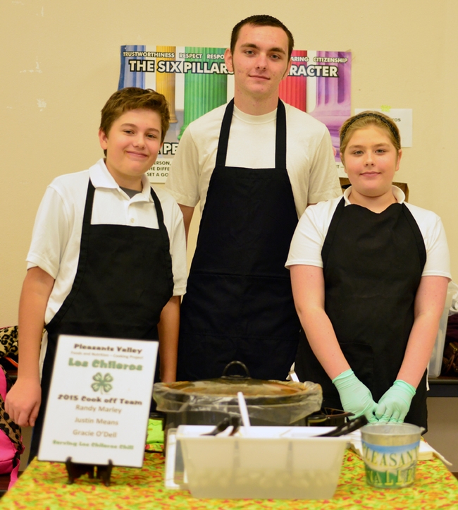 The Los Chilerios team from Pleasants Valley 4-H Club, Vacaville, made a very good chili at the Solano County 4-H Chili Cookoff, the judges agreed. From left are Justin Means, Randy Marley and Gracie O’Dell. (Photo by Kathy Keatley Garvey)