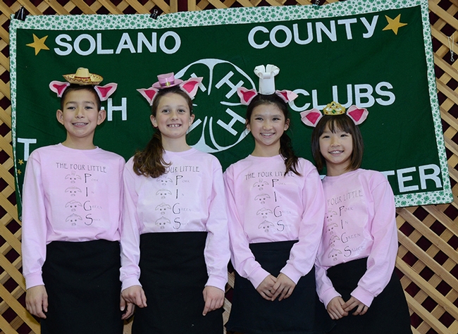 The Four Little PIGS (Pork in Green Sauce) drew applause as the winners of the 2016 Solano County 4-H Chili Contest. From left are Spencer Merodio, Alexis Taliaferro, Natalie Frenkel and Kate Frenkel, all of the Suisun Valley 4-H Club. (Photo by Kathy Keatley Garvey)