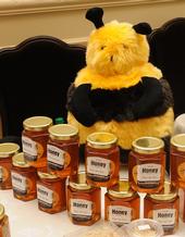A BEE with jars of honey graced a table at the Bee Informed event. This display is the work of Nancy and Donna Stewart of Sacramento Beekeeping Supplies. (Photos by Kathy Keatley Garvey)