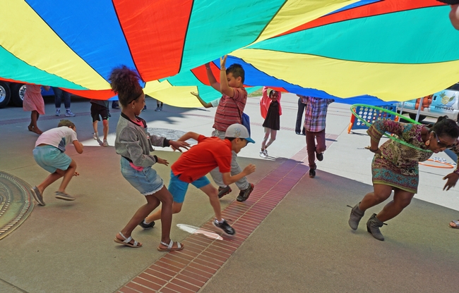 Physical activities at the picnic included parachute play.