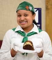 Celeste Harrison with her prize-winning chocoflan dessert. (Photo by Kathy Keatley Garvey)