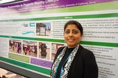 UCCE nutrition, family and consumer sciences advisor Deepa Srivastava in front of one of the posters she presented at the California Childhood Obesity Conference.