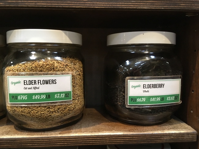 Jars of elderberry products at a supermarket