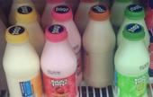 Flavored milk on a shelf.