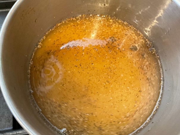 Syrup mixture heating on stove.