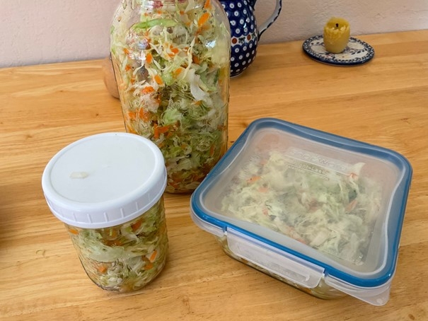 Coleslaw in various containers.