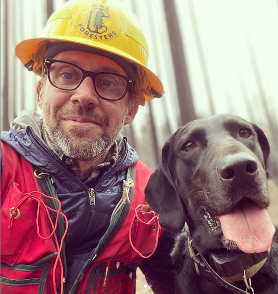 Tompkins pictured with his dog Boone.