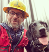 Tompkins pictured with his dog Boone.