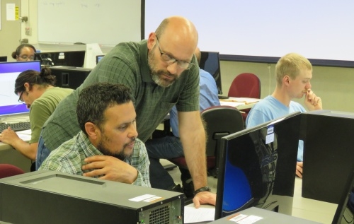 Shane Feirer helps a participant at Forest GIS workshop in Santa Rosa, March 2019