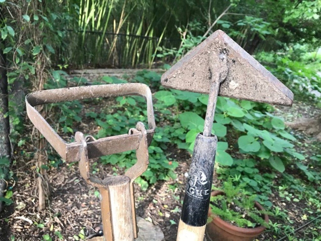 Use a hoe to remove weeds. (dallasnews.com)
