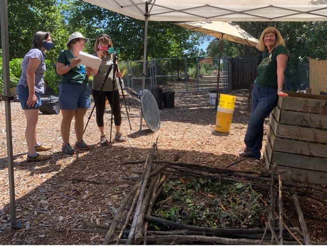 Hard at work, the video team reviews the video objectives before filming a video with tips on composting. for UC Master Gardener Program Statewide Blog Blog