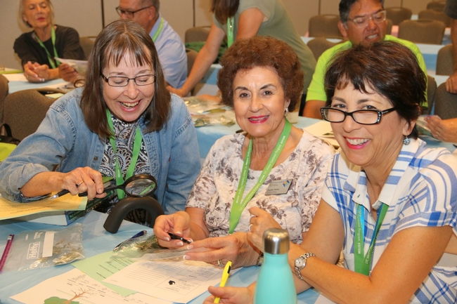 Conference attendees learning about diagnosing plant and pest diseases with the intensive session, Plant Diagnostics, with speaker Janine Hasey (not pictured). ©UC Regents / Melissa Womack