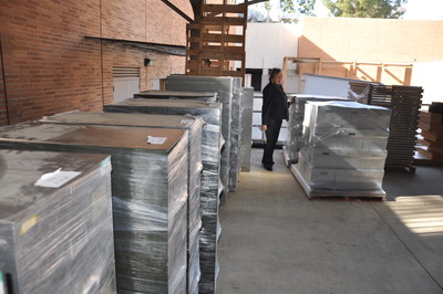 Linda Vida, the director of the Water Resources Center Archives, inspects materials as they arrive