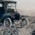 Vintage Ventura County Advisor and Vehicle in Field