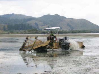 Aquatic weed harvester in New Zealand