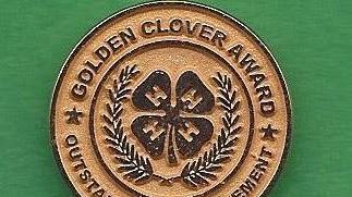 Golden Clover Award pin
