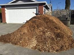 Mulch pile on driveway