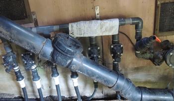 Valves aren’t that interesting to look at, but are integral to a drip or sprinkler system. Photo: Diane Lynch