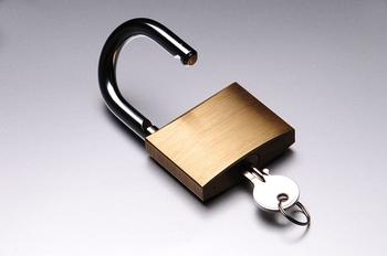 Open padlock with key