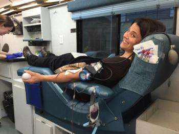 Lauren Snowden donating blood for UC ANR mobile blood drive
