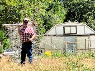 UCCE Livestock and Natural Resources Advisor Dan Macon demonstrates setting up electro-net fencing