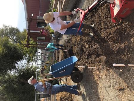 Rivertown rototilling and adding organic soil. Photo by Bette Sindzinski