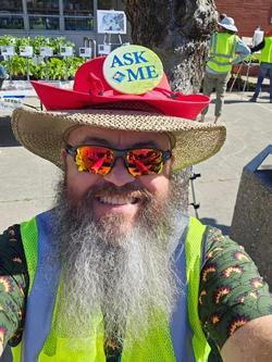 Enthusiastic UC Master Gardener Jim Marchetti takes a selfie at the Richmond GTPS while he helps the many customers.