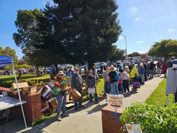 The nearly 500 West County GTPS customers line up around the block and wait for the sale to start.