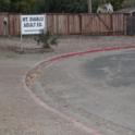 The original eyesore: a vacant lot used for parking & dumping.