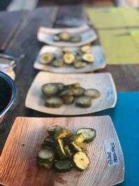 plates of cucumber pickle slices, SPARK Social SF event, fall 2018 - J. Lee & A. Lee