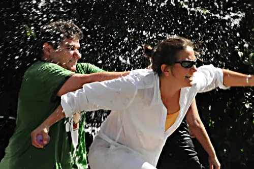 Research scientist Christophe Morisseau of the Hammock lab scores a hit on graduate student Karen Wagner. (Photo by Kathy Keatley Garvey)