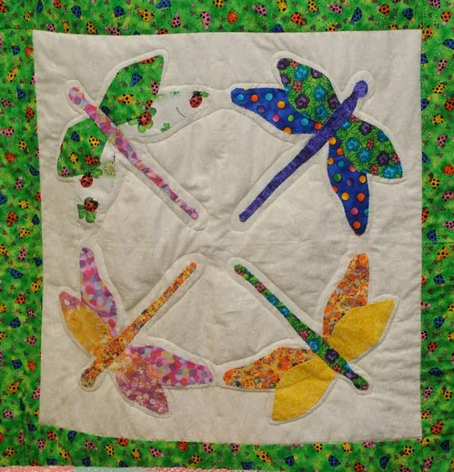 DRAGONFLY QUILT, on display at the 134th annual Dixon May Fair, May 7-10, is the work of Lillian Walker of Antioch. This show a small section. (Photo by Kathy Keatley Garvey)