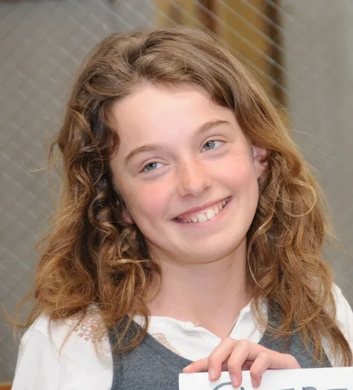 BEE PROJECT--Bay Area resident Sheridan Miller raised $733 to help bee research at the Harry H. Laidlaw Jr. Honey Bee Research Facility at UC Davis. (Photo by Kathy Keatley Garvey)