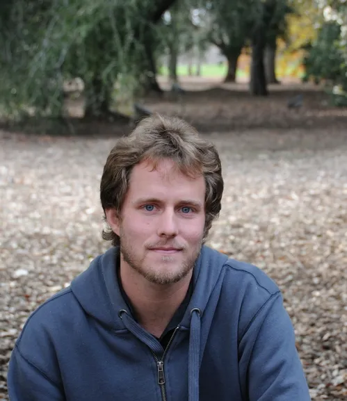 UC DAVIS RESEARCHER Ian Pearse in front of the Peter J. Shields Oak Grove, on Garrod Drive, UC Davis Arboretum. Pearse received a fellowship from the National Science Foundation for his oak tree research. Long interested in plant biochemistry, he joined the UC Davis graduate program in entomology in 2006, after studying a year in Germany with the Max Planck Society for Chemical Ecology. He received his bachelor of science degree in plant biology from the University of Illinois, Urbana-Champaign, in 2004.(P