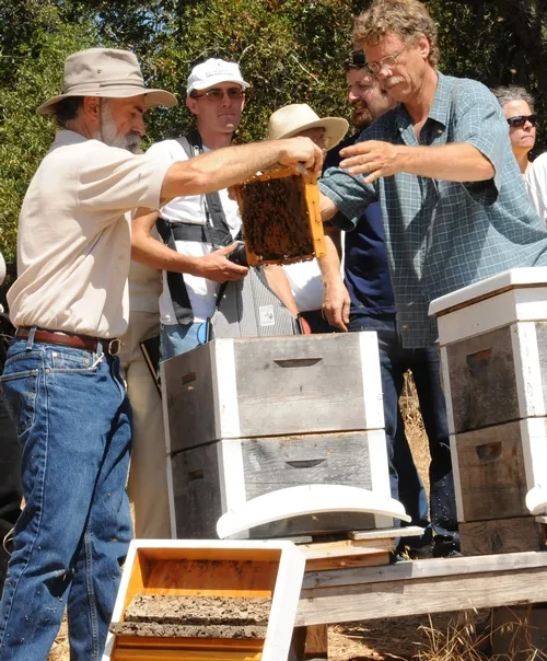SPEAKERS at the 2010 Bee Symposium, set March 7 in Sebastopol, will include Serge Labesque (left), a beekeeper in Glen Ellen, Sonoma County, and Randy Oliver (far right, in blue shirt), a researcher and beekeeper in Grass Valley, Nevada County. The two were among the speakers at the 2009 Western Apicultural Society meeting in Healdsburg, where this photo was taken. (Photo by Kathy Keatley Garvey)