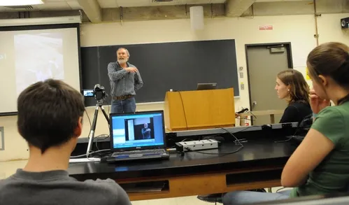 SPEAKER Terry Griswold of the USDA-ARS speaks at a noonhour lecture at the UC Davis Department of Entomology. In the foreground are Webcasters and graduate students James Harwood and Amy Morice of the James Carey lab. Directly in front of Morice is Emily Bzydk, a graduate student who studies with major professor Lynn Kimsey. (Photo by Kathy Keatley Garvey)