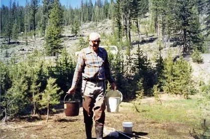 AT WORK--William C. Reeves collecting mosquitoes in Baker County, Ore., in 1993. (Photo by Bruce Eldridge)