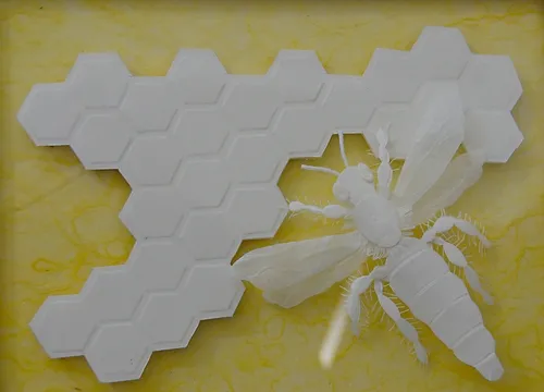 'QUEEN BEE' is a paper sculpture by talented artist Marilyn Judson of Davis. This is a three-dimensional art piece now on display in the Pence Gallery, Davis. The background of this photo was darkened in Photoshop for contrast purposes.(Photo by Kathy Keatley Garvey)