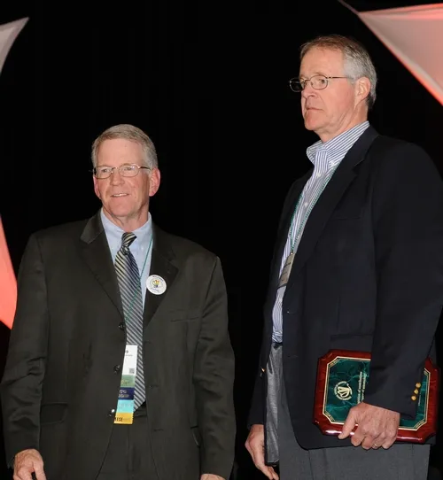 NEWLY INDUCTED FELLOW Thomas Scott (right), professor of entomology at the University of California, Davis, with ESA president Dave Hogg. (Photo by Kathy Keatley Garvey)
