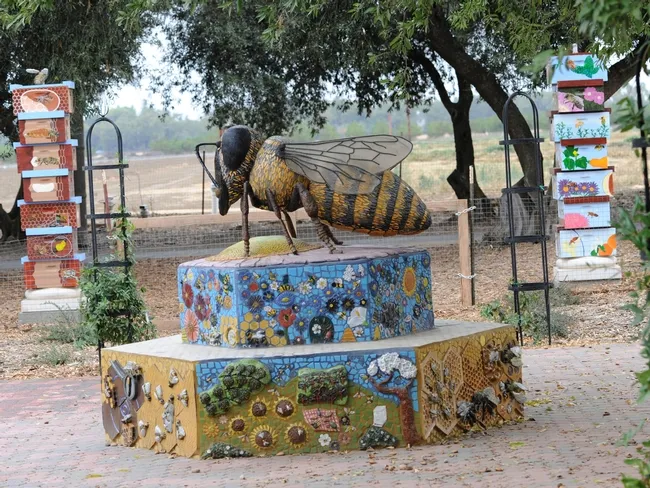 The colorful bee boxes (background) were shown on the TV program. (Photo by Kathy Keatley Garvey)