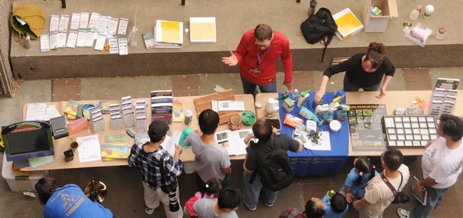 Entomologist/principal editor Steve Dreistadt (red shirt) of UC IPM answers questions about insects. (Photo by Kathy Keatley Garvey)