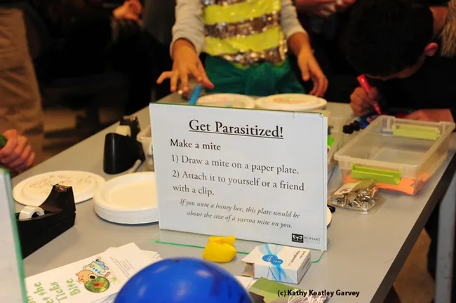 Get parasitized! The sign at the Bohart Museum says it all. (Photo by Kathy Keatley Garvey)