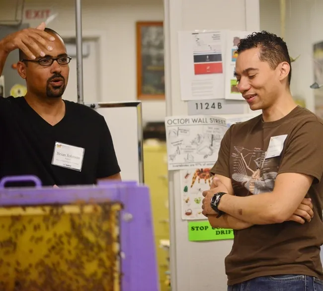 UC Davis entomology graduate student Ralph Washington (right) chats with UC Davis assistant professor/bee biologist Brian Johnson at the Bohart Museum open house on Sept. 27. (Photo by Kathy Keatley Garvey)