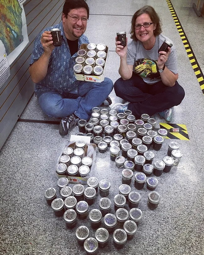 Sacramento City College professor Dave Wyatt and Folsom Lake College assistant professor Fran Keller, co-leaders of the Belize expedition, show some of the insects collected on the Belize trip. (Photo courtesy of Fran Keller)