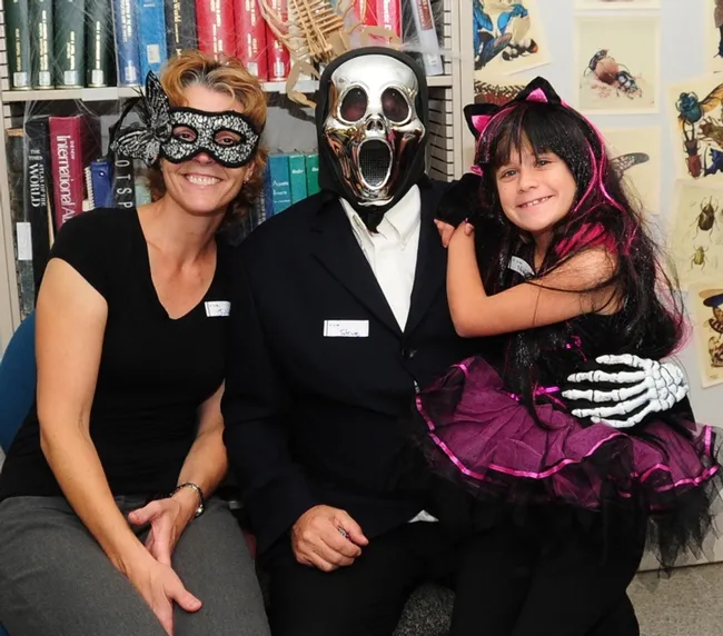 That's the spirit! From left are Julie Tillman and husband Steve Seybold and their daughter Natalie. (Photo by Kathy Keatley Garvey)