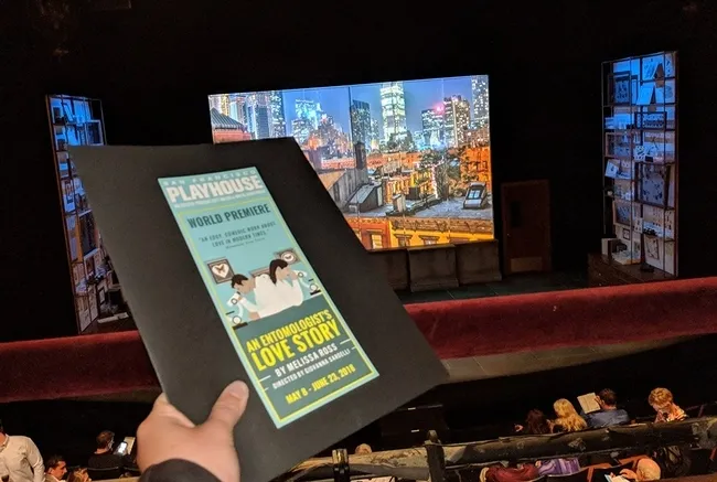 UC Davis entomologist Emily Bick with her program at "An Entomologist's Love Story." (Photo by Kathy Keatley Garvey)