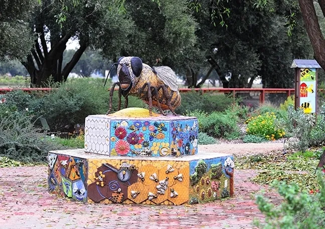 A mosaic-ceramic sculpture, Miss Bee Haven, anchors the Häagen-Dazs Honey Bee Haven. It is the work of Donna Billick of Davis, a self-described "rock artist." (Photo by Kathy Keatley Garvey)